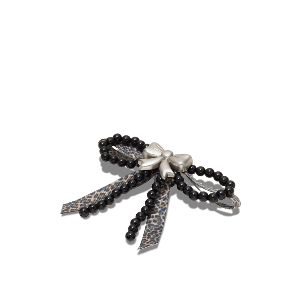 Jibbitz™ Charm Silver Cheetah Bow